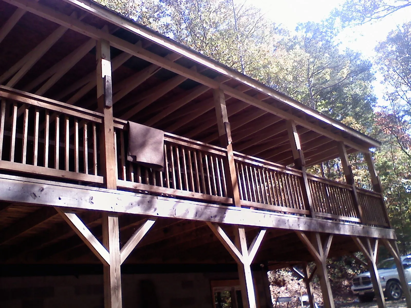 Timber framing under a new elevated porch and deck — Roof Leak Repair in Carbondale by Roofing Brothers